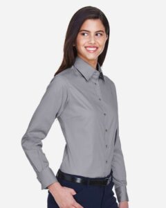 Harriton M500W Women’s Easy Blend™ Twill Dress Shirt with Stain-Release – Dark Grey (on model side)