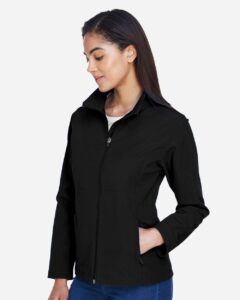 Team 365 TT80W Women’s Leader Soft Shell Jacket – Black (on model side)