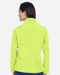 Team 365 TT80W Women’s Leader Soft Shell Jacket – Safety Yellow (on model back)