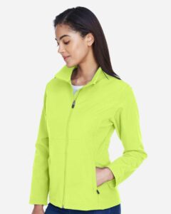 Team 365 TT80W Women’s Leader Soft Shell Jacket – Safety Yellow (on model side)