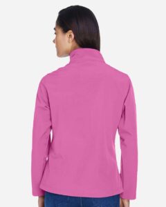 Team 365 TT80W Women’s Leader Soft Shell Jacket – Sport Charity Pink (on model back)