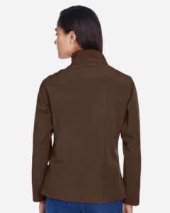 Team 365 TT80W Women’s Leader Soft Shell Jacket – Sport Dark Brown (on model back)