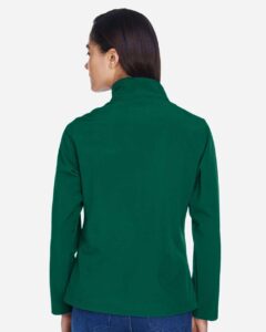 Team 365 TT80W Women’s Leader Soft Shell Jacket – Sport Forest (on model back)