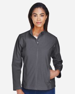 Team 365 TT80W Women’s Leader Soft Shell Jacket – Sport Graphite (on model)