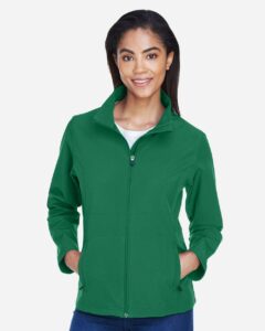 Team 365 TT80W Women’s Leader Soft Shell Jacket – Sport Kelly (on model)