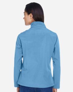 Team 365 TT80W Women’s Leader Soft Shell Jacket – Sport Light Blue (on model back)