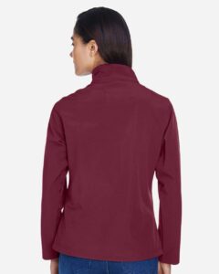 Team 365 TT80W Women’s Leader Soft Shell Jacket – Sport Maroon (on model back)