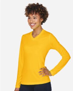 Team 365 TT11WL Women’s Zone Performance Long Sleeve T-Shirt – Sport Athletic Gold (on model side)