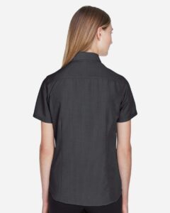 Harriton M560W Women’s Barbados Textured Camp Shirt – Black (on model back)