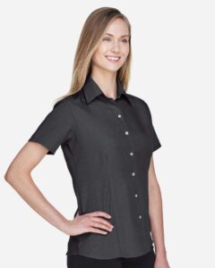 Harriton M560W Women’s Barbados Textured Camp Shirt – Black (on model side)