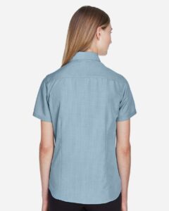 Harriton M560W Women’s Barbados Textured Camp Shirt – Cloud Blue (on model back)