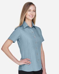 Harriton M560W Women’s Barbados Textured Camp Shirt – Cloud Blue (on model side)