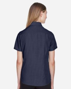 Harriton M560W Women’s Barbados Textured Camp Shirt – Navy (on model back)