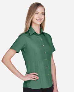 Harriton M560W Women’s Barbados Textured Camp Shirt – Palm Green (on model side)