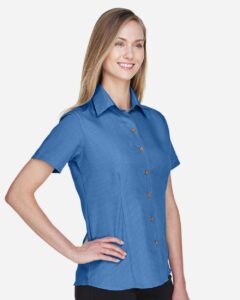 Harriton M560W Women’s Barbados Textured Camp Shirt – Pool Blue (on model side)