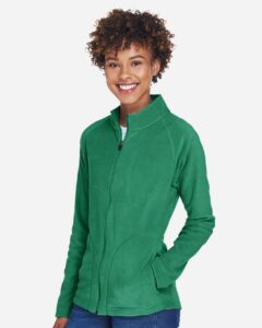 Team 365 TT90W Women’s Campus Microfleece Jacket – Sport Kelly (on model side)