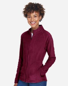 Team 365 TT90W Women’s Campus Microfleece Jacket – Sport Maroon (on model side)