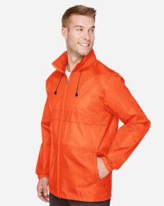 Team 365 TT73 Unisex Zone Protect Lightweight Jacket – Sport Orange (on model side)
