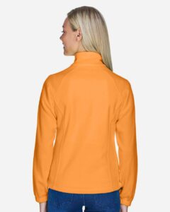 Harriton M990W Women’s Full-Zip Fleece – Safety Orange (on model back)