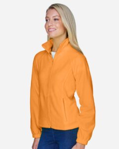 Harriton M990W Women’s Full-Zip Fleece – Safety Orange (on model side)