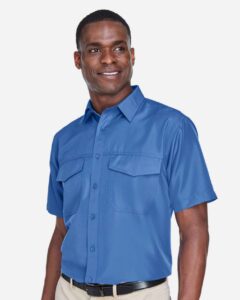 Harriton M580 Men’s Key West Short Sleeve Performance Staff Shirt – Pool Blue (on model side)