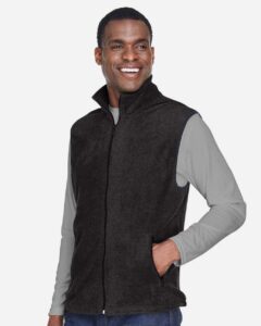 Harriton M985 Unisex Fleece Full-Zip Vest – Black (on model side)