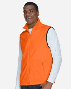 Harriton M985 Unisex Fleece Full-Zip Vest – Safety Orange (on model side)