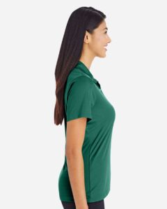 Team 365 TT51W Women’s Zone Performance Polo – Sport Forest (on model side)