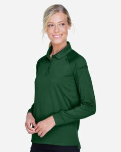 Harriton M211LW Women’s Advantage Long Sleeve Tactical Polo – Dark Green (on model side)