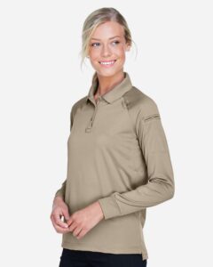 Harriton M211LW Women’s Advantage Long Sleeve Tactical Polo – Desert Khaki (on model side)