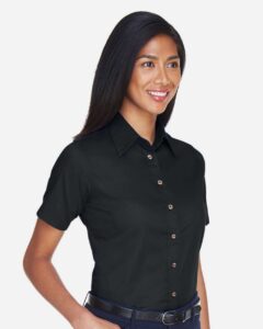 Harriton M500SW Women’s Easy Blend™ Short Sleeve Twill Dress Shirt with Stain-Release – Black (on model side)