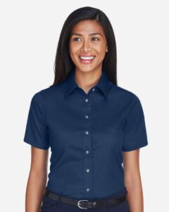 Harriton M500SW Women’s Easy Blend™ Short Sleeve Twill Dress Shirt with Stain-Release – Navy (on model)