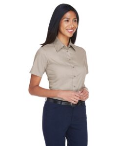 Harriton M500SW Women’s Easy Blend™ Short Sleeve Twill Dress Shirt with Stain-Release – Stone (on model side)
