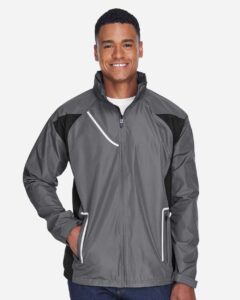 Team 365 TT86 Men’s Dominator Waterproof Jacket – Sport Graphite (on model)