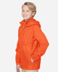 Team 365 TT73Y Youth Zone Protect Lightweight Jacket – Sport Orange (on model side)