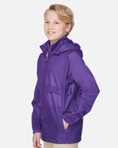 Team 365 TT73Y Youth Zone Protect Lightweight Jacket – Sport Purple (on model side)