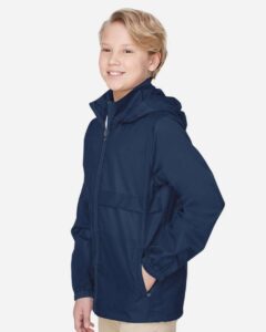 Team 365 TT73Y Youth Zone Protect Lightweight Jacket – Sport Dark Navy (on model side)