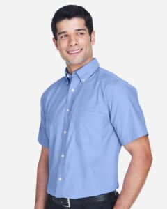 Harriton M600S Men’s Oxford Short Sleeve with Stain-Release – Light Blue (on model side)