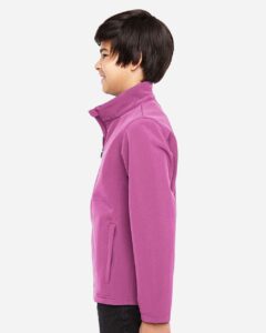 Team 365 TT80Y Youth Leader Soft Shell Jacket – Sport Charity Pink (on model side)
