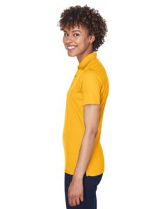 UltraClub 8210L Women’s Cool & Dry Mesh Piqué Polo – Gold (on model side)