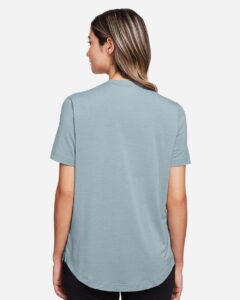 North End NE100W Women’s JAQ Snap-Up Stretch Performance Polo – Opal Blue (on model back)