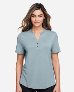 North End NE100W Women’s JAQ Snap-Up Stretch Performance Polo – Opal Blue (on model)