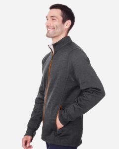 North End NE712 Men’s Flux 2.0 Full-Zip Jacket – Black Heather/ Orange Soda (on model side)
