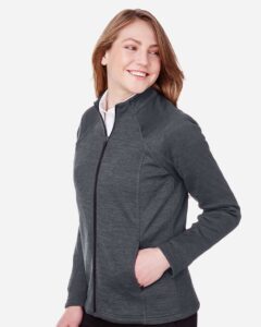 North End NE712W Women’s Flux 2.0 Full-Zip Jacket – Carbon Heather/ Black (on model side)