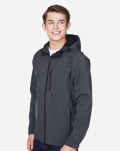 North End 88166 Men’s Prospect Two-Layer Fleece Bonded Soft Shell Hooded Jacket – Fossil Grey (on model side)