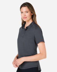 North End NE110W Women’s Revive Coolcore® Polo – Carbon (on model side)