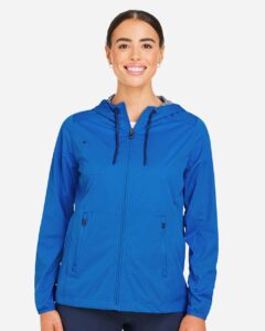 North End NE75W Women’s Network Lightweight Jacket – Light Nautical Blue Heather (on model)