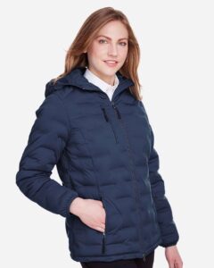 North End NE708W Women’s UTK SubDown Loft Puffer Jacket – Classic Navy/ Carbon (on model side)