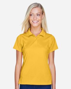 Harriton M315W Women’s Polyester Jersey Polo – Gold (on model)