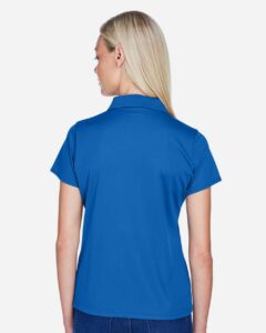 Harriton M315W Women’s Polyester Jersey Polo – True Royal (on model back)